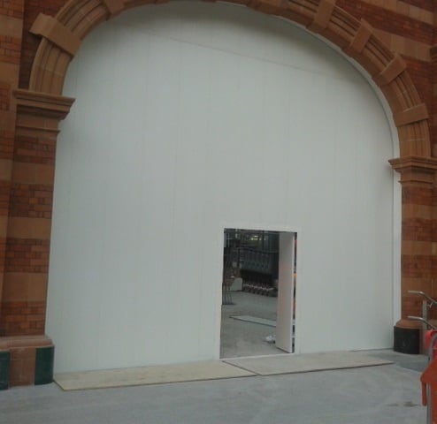 Hoarded Archway with Door