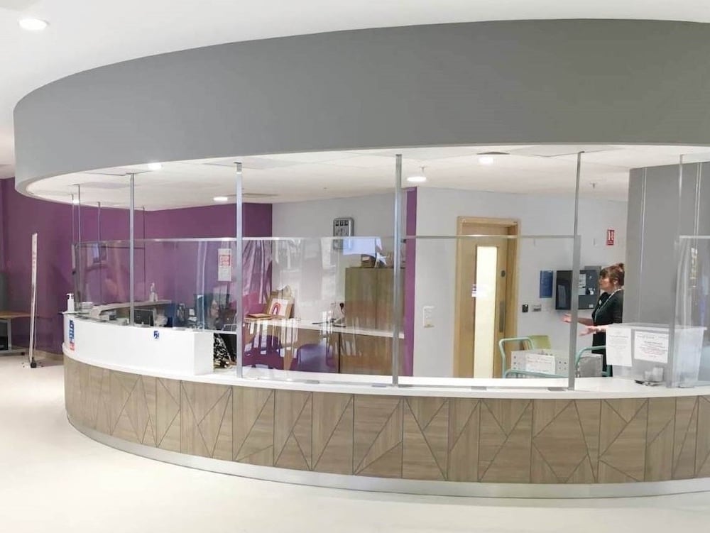 Curved PVC Protective Screen in Hospital Reception