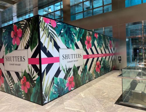 Multi-phase hoardings with bespoke Canary Wharf graphics at One Canada Square