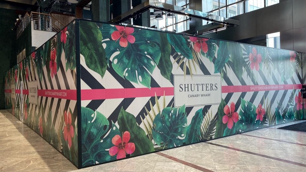 PVC hoarding with graphics at Canary Wharf