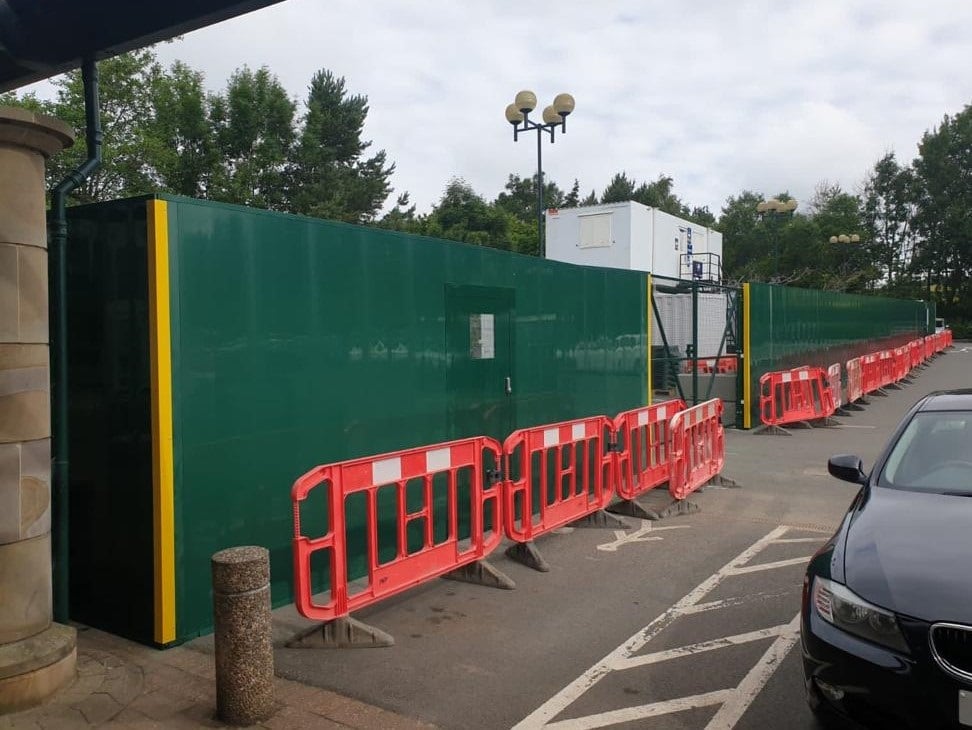Green PVC outdoor hoarding at Morrisons Glasgow