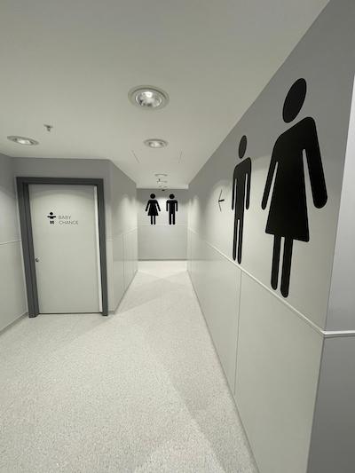 Toilet corridor showing graphics